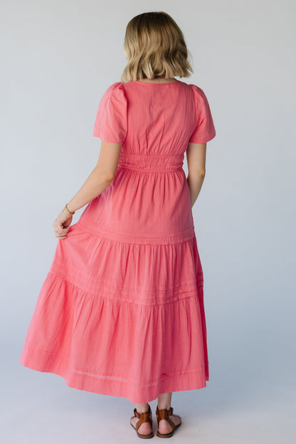 Back view of pink midi with wide elastic waist and short sleeves