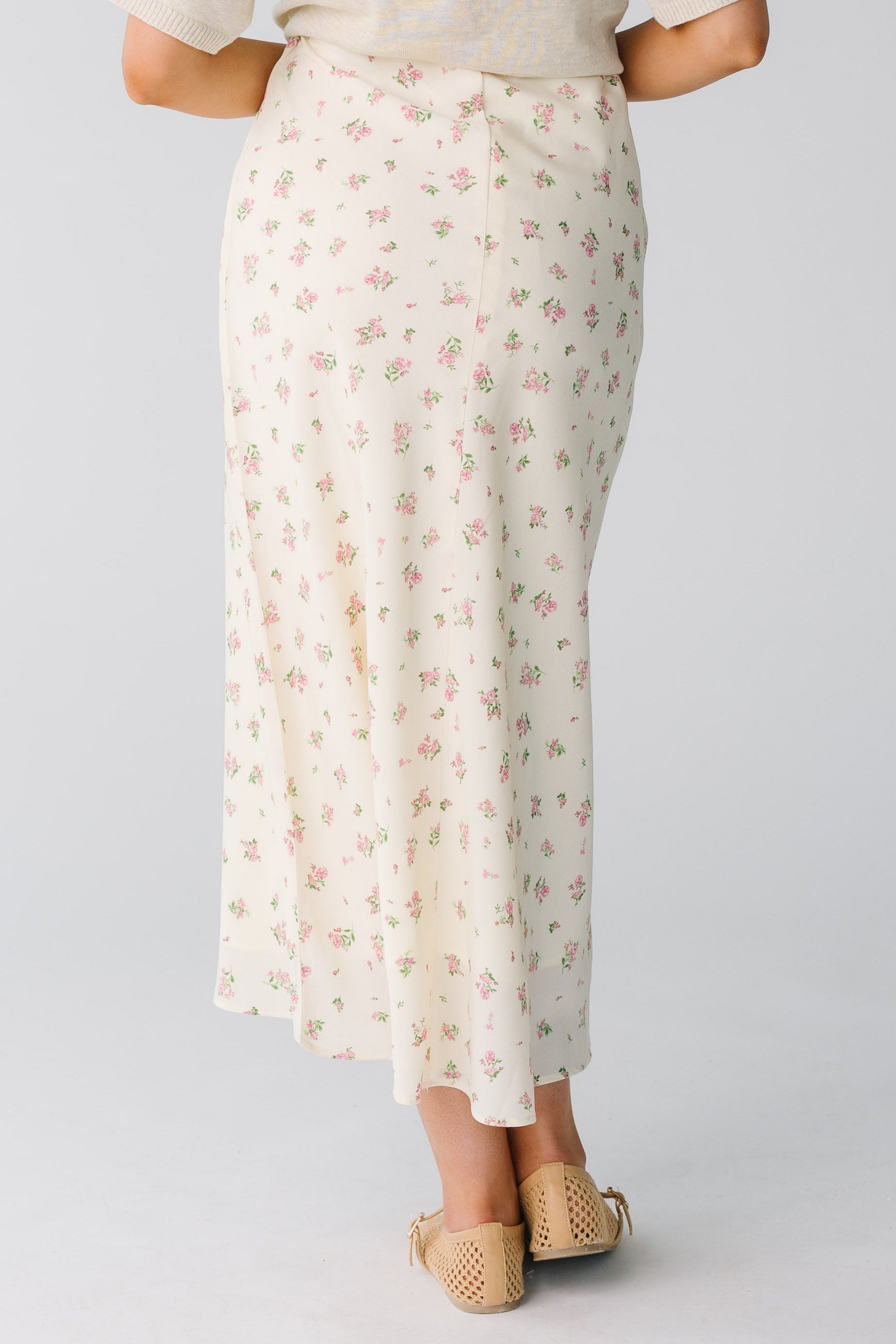 Back view of ivory A-line midi