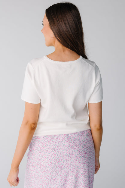 Back view of round neck sweater with short sleeves