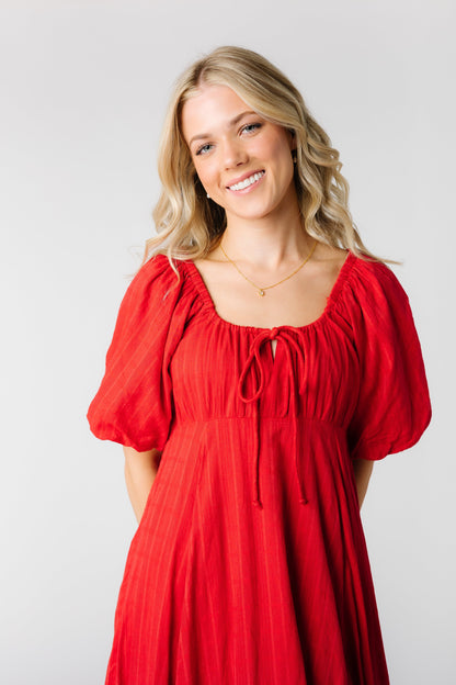 Modest red textured dress with round neckline