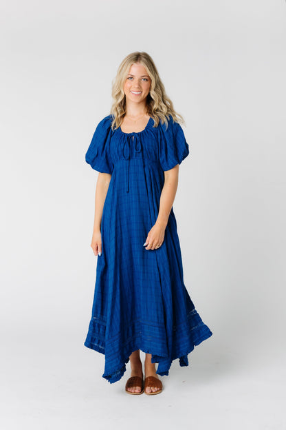 Modest blue textured dress with round neckline and puff sleeves