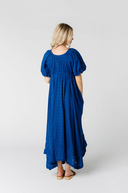 Back view of blue round neck midi dress