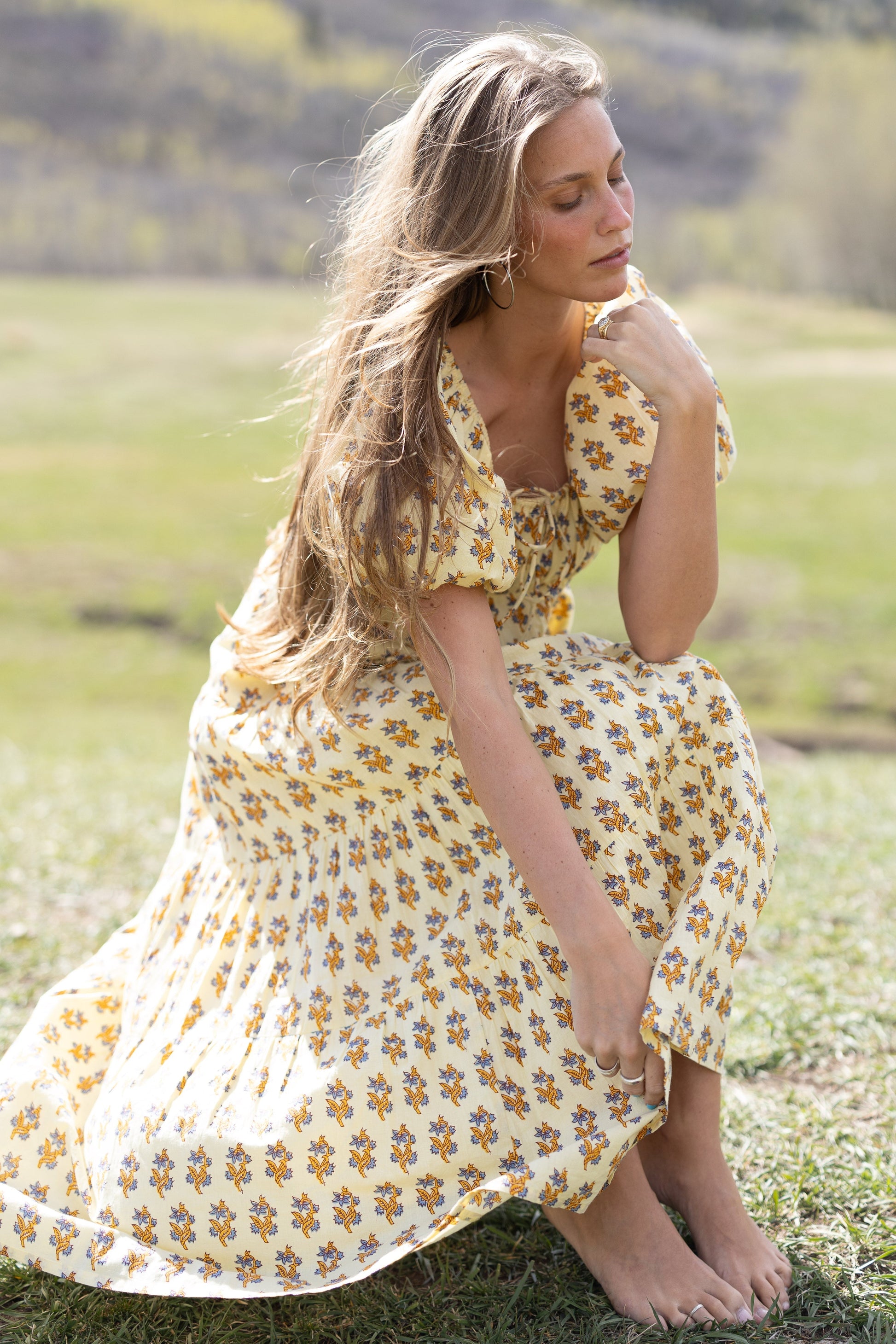 Citrus Lyon Tiered Dress in yellow floral print for women and teens.