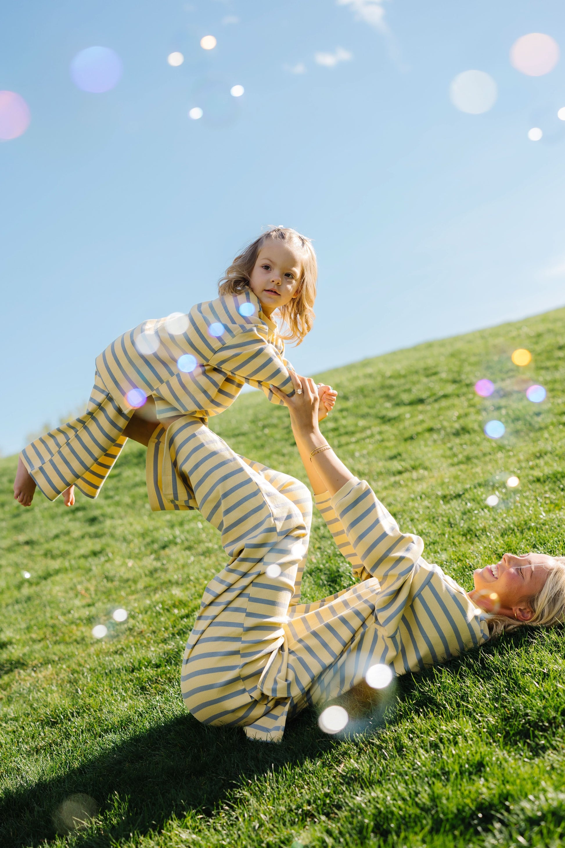 Woman and little girl wearing loose fitting lounge set.