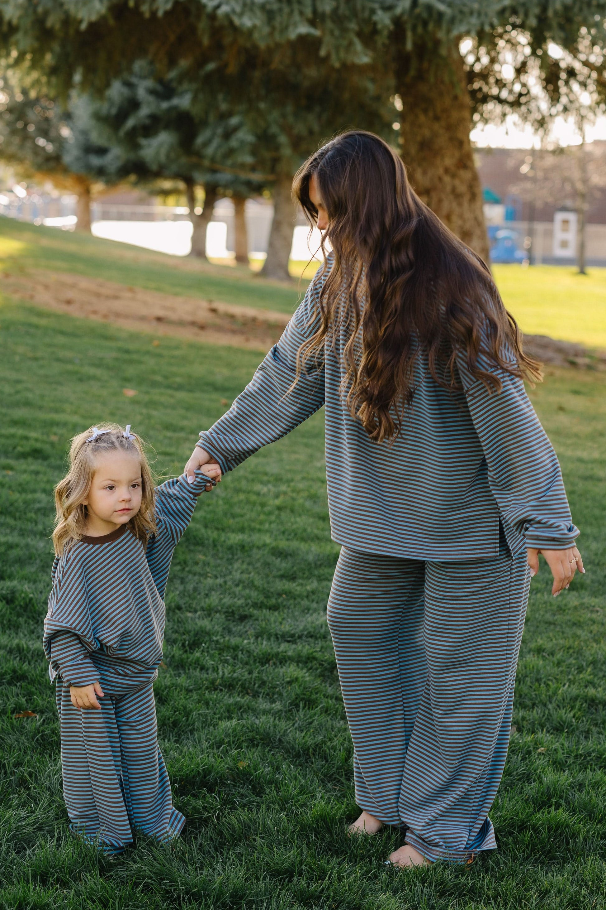 Loose fitting lounge set for girls in a blue & brown stripe.