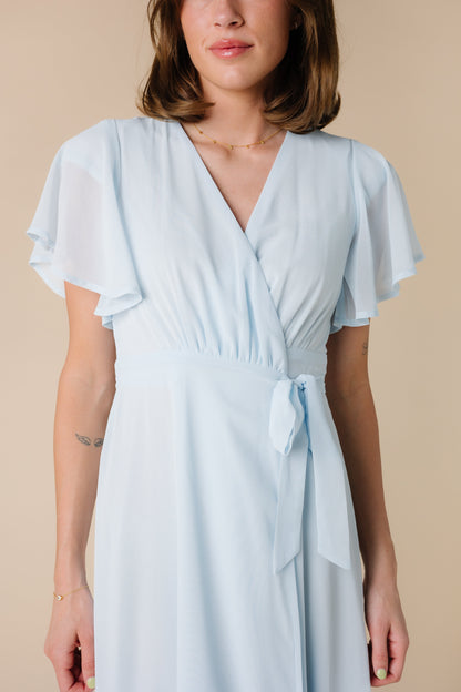 Close view of light blue wrap maxi bridesmaid dress