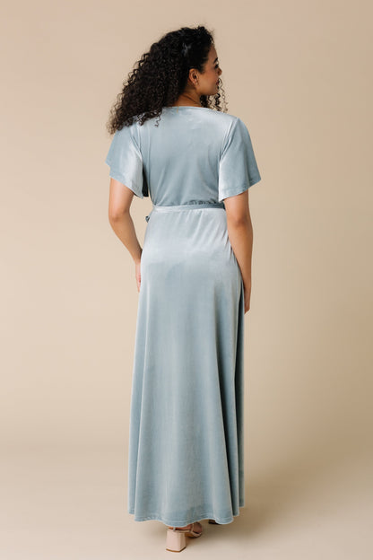 Back view of light blue velvet maxi dress