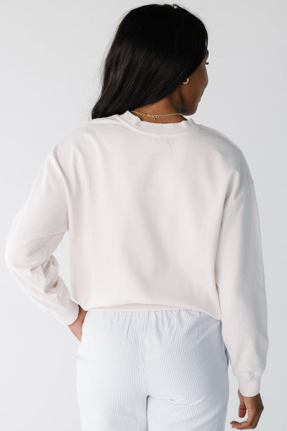 Back view of white sweatshirt