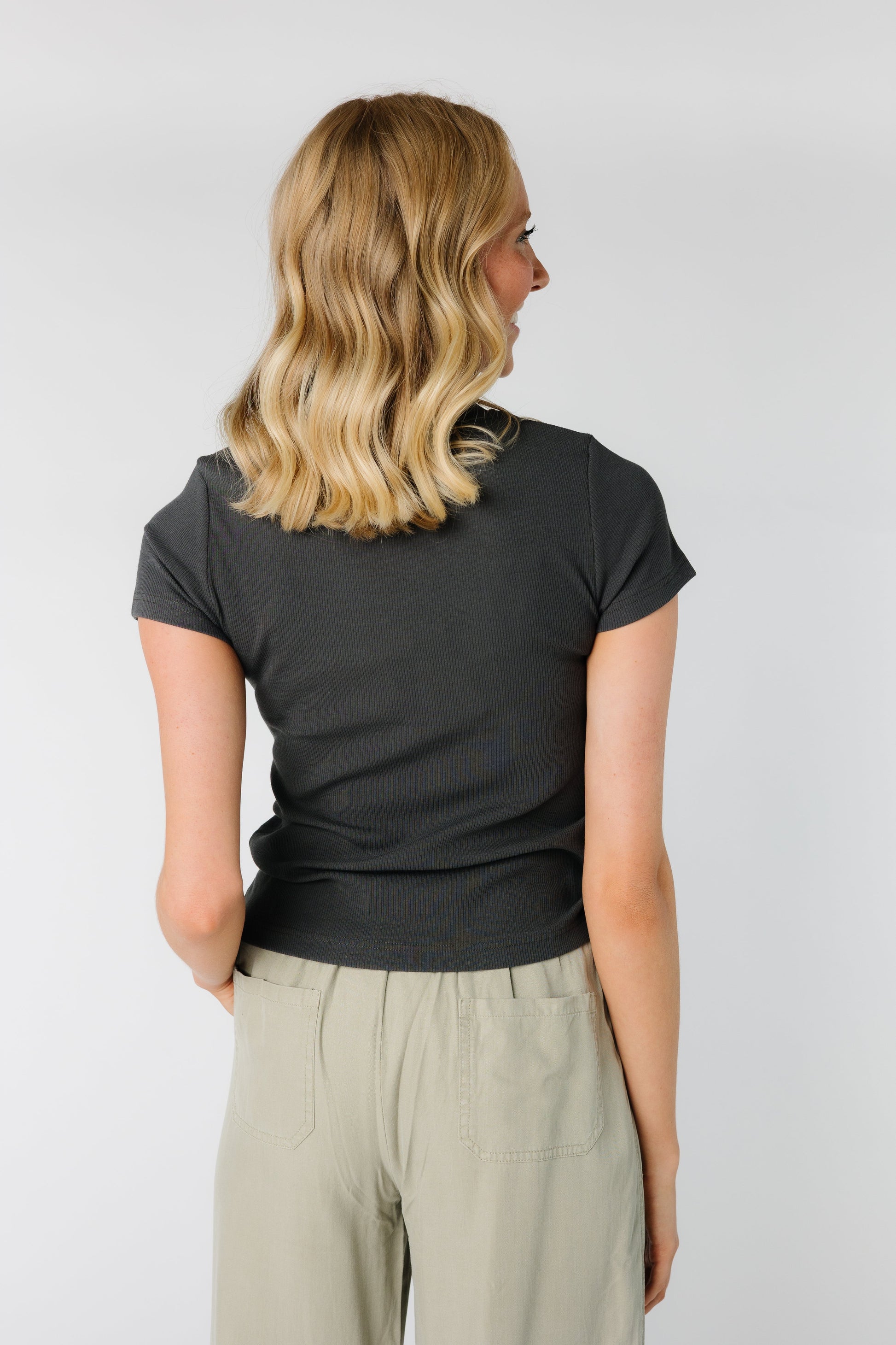 Back view of black short sleeve tee