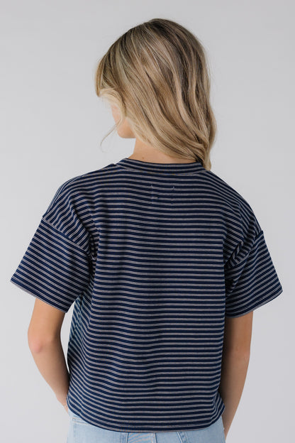 Back view of navy and white stripe boxy tee