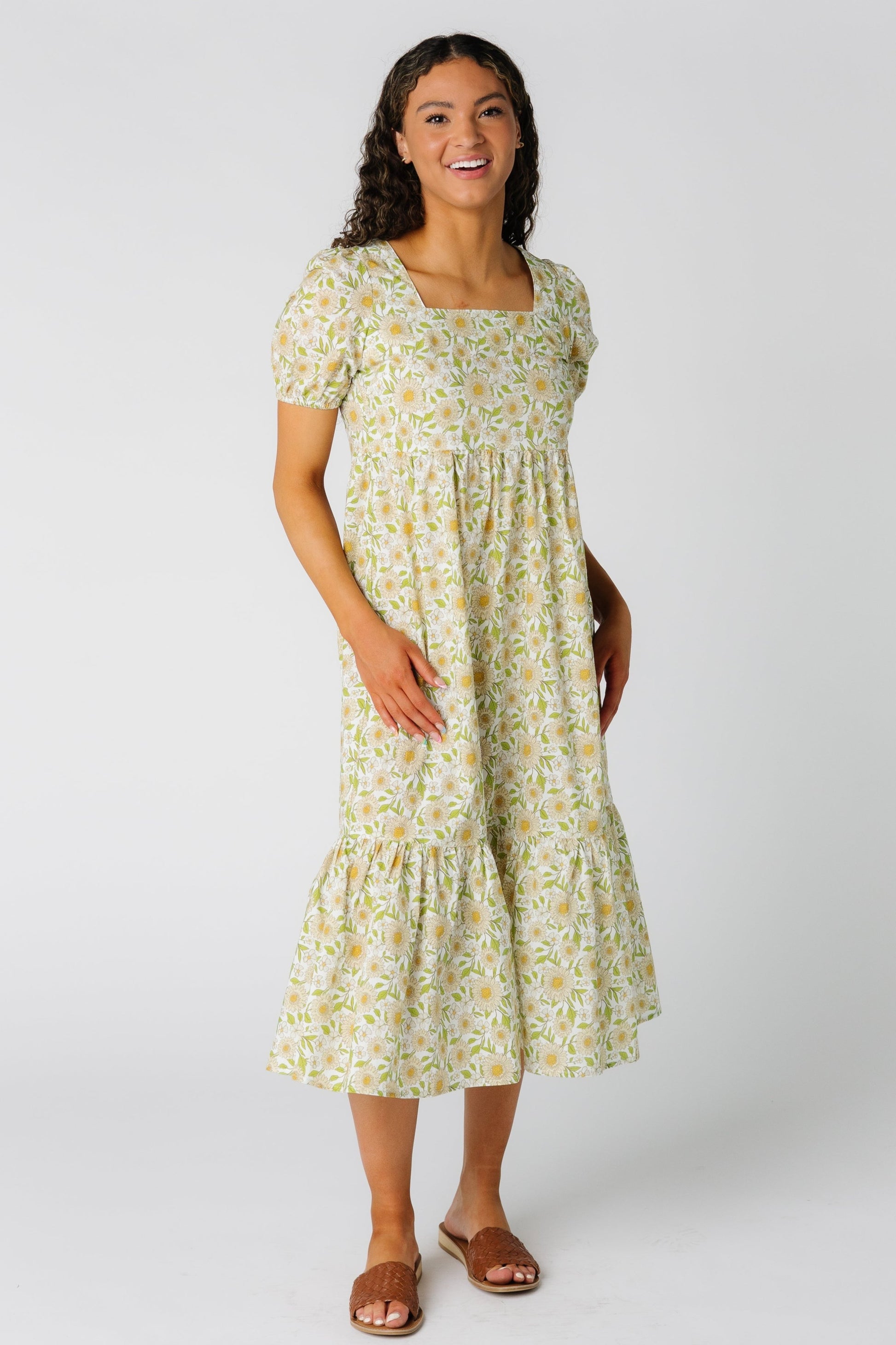 Yellow floral print midi with wide bottom ruffle