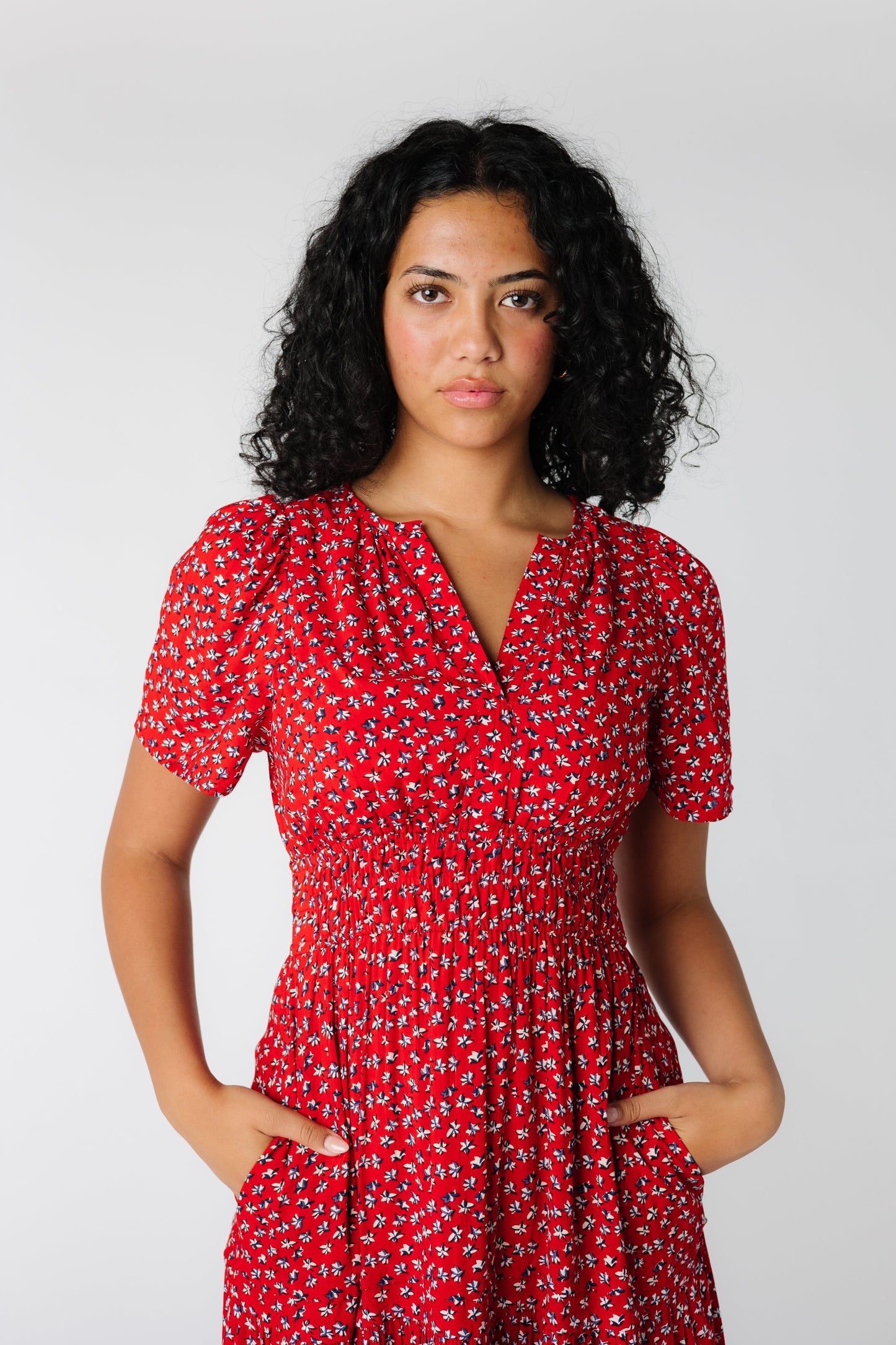 Red floral print dress with  V-neck with short sleeves