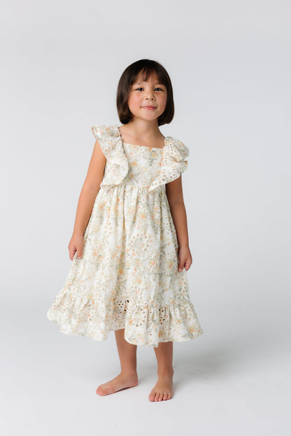 Girl's modest floral dress with square neckline and wide bottom ruffle 