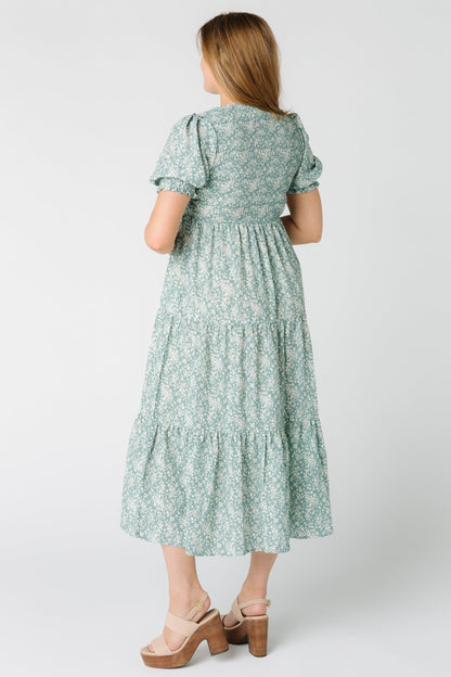 Back view of Dusty Teal print dress with puff sleeves  