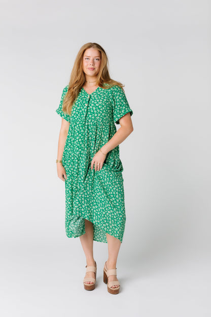 Front view of green floral print midi dress with short sleeves