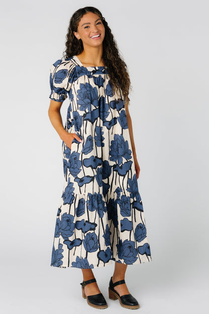Modest women's floral print midi dress with short sleeves