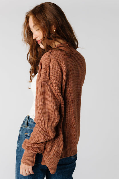 Chunky sweater with long sleeves and exposed seams