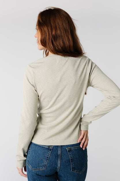 Back view of long sleeve top in light sage