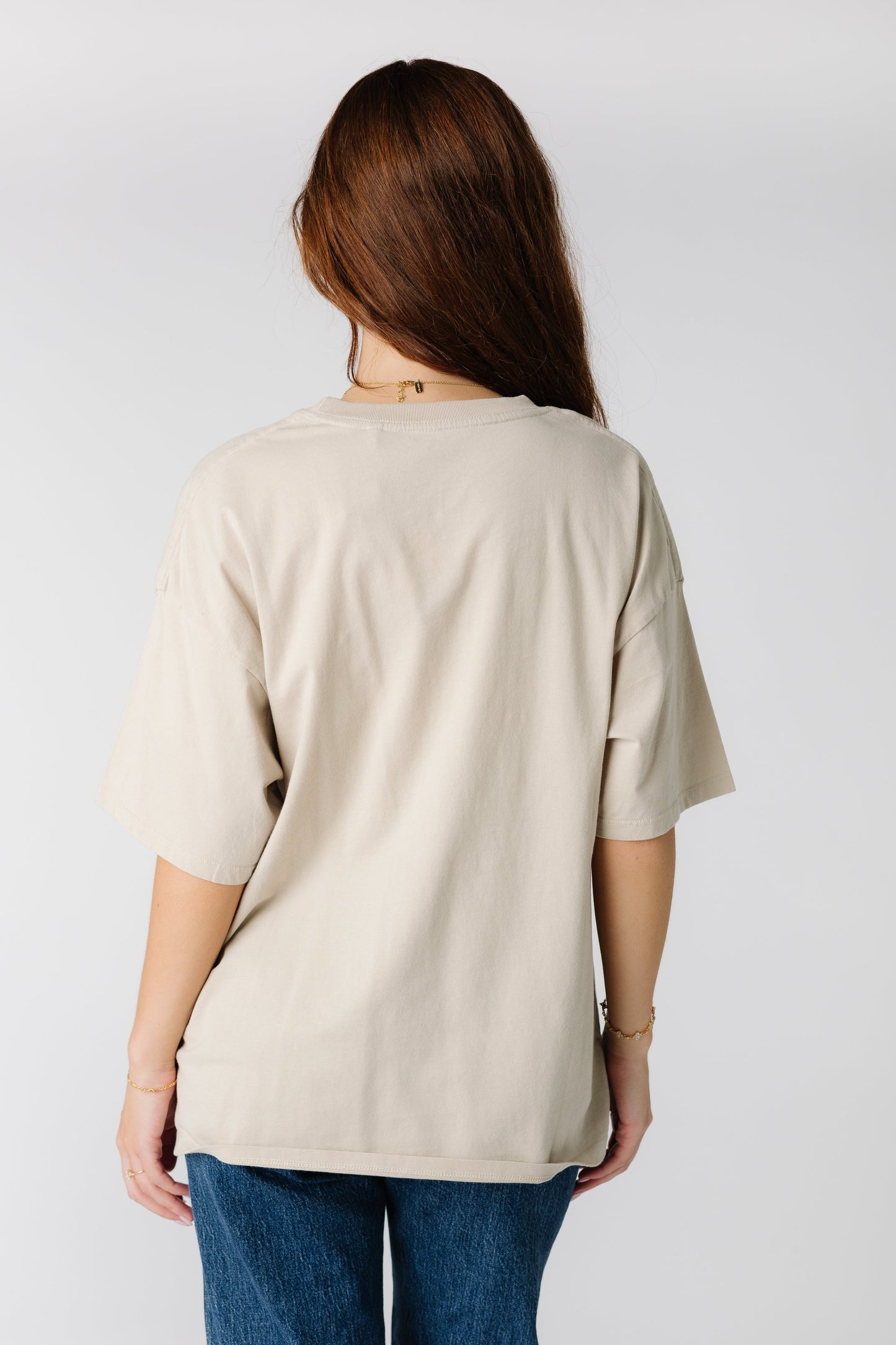 Back view of light tan short sleeve tee