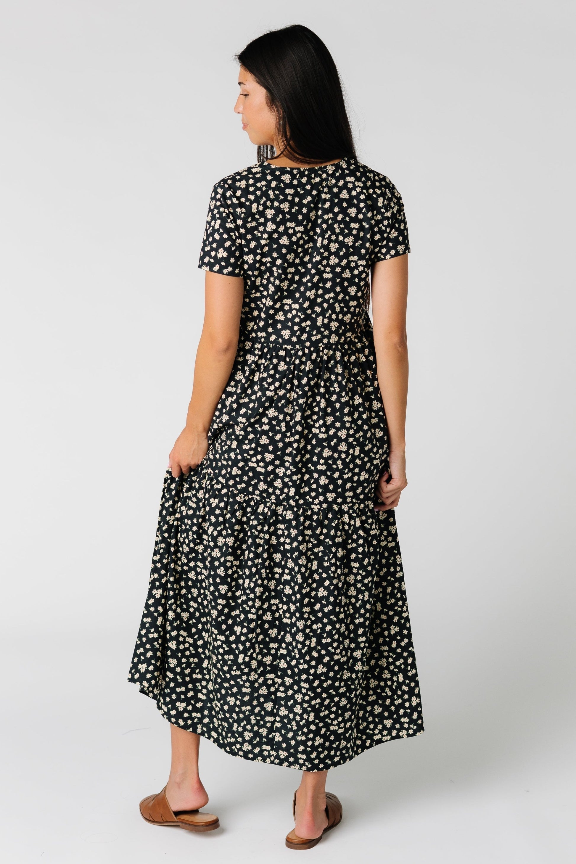 Back view of black floral print midi 