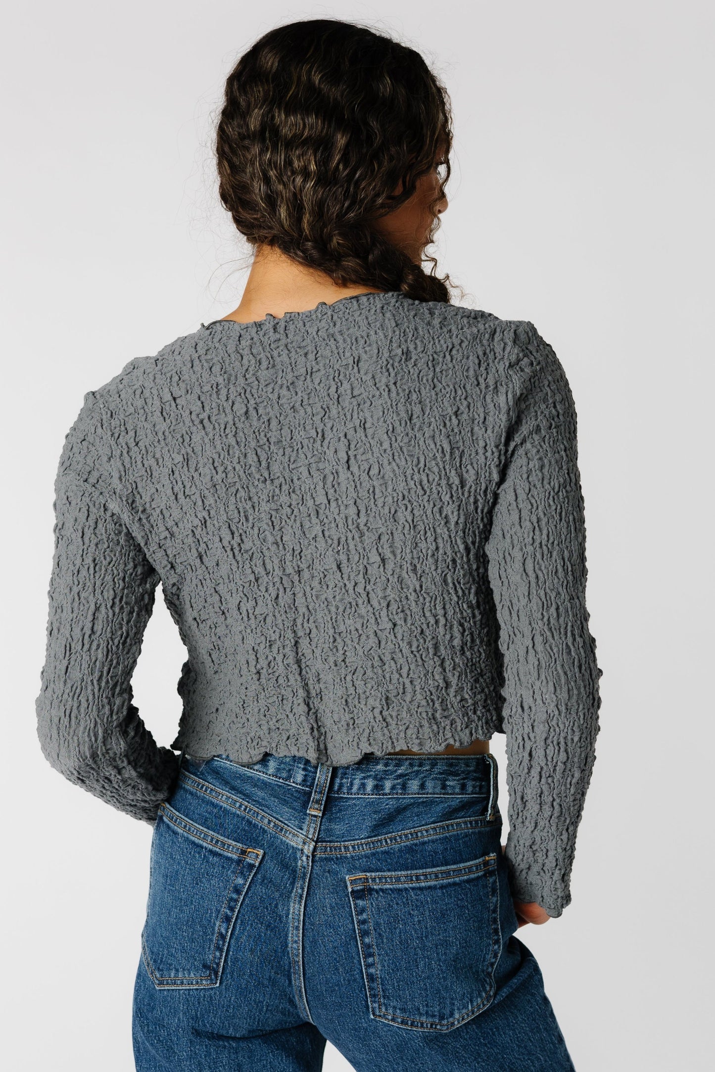 Back view of grey textured top