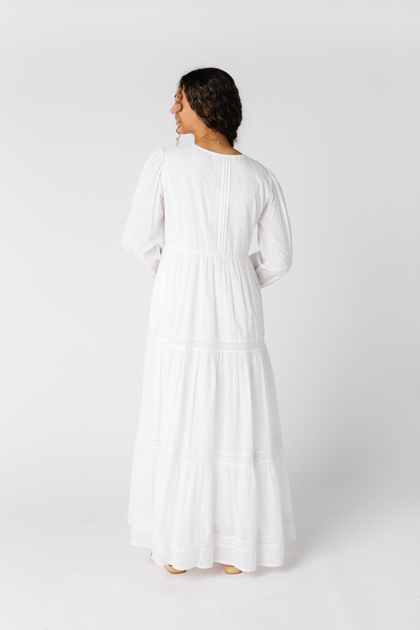 Back view of all white maxi