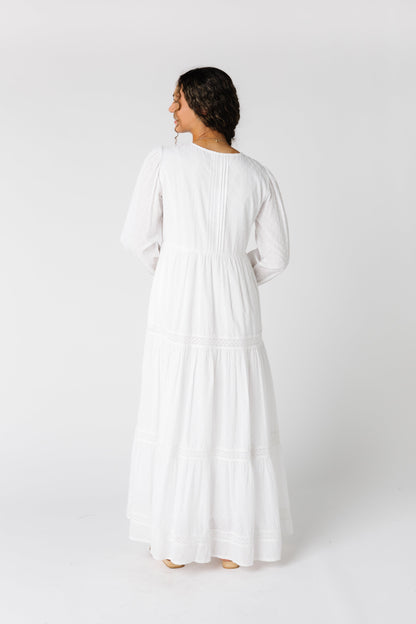 Back view of all white maxi