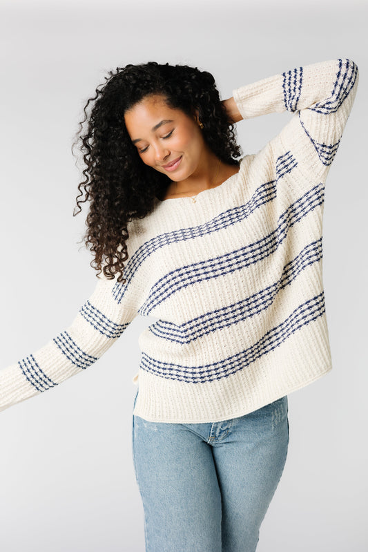 White modest long sleeve sweater with navy stripes