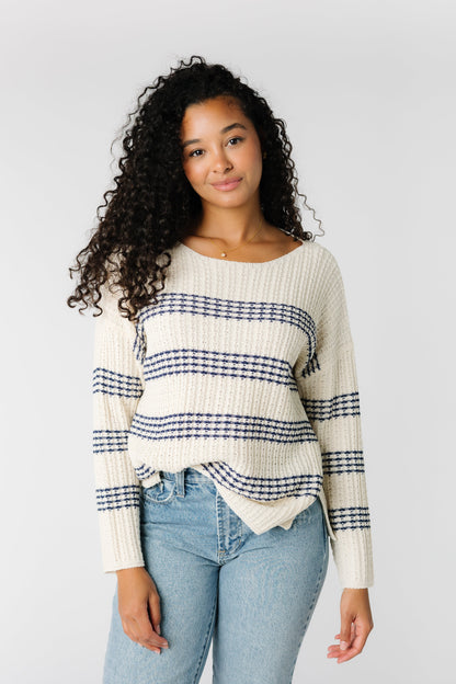 Off white long sleeve sweater with navy stripes