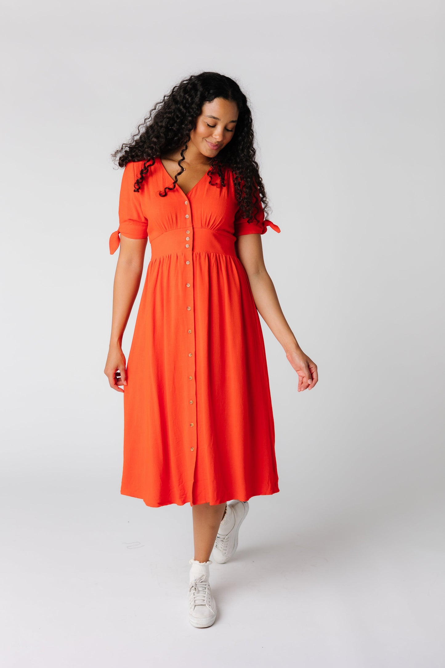 Red midi dress by Brass and Roe with short tie sleeves