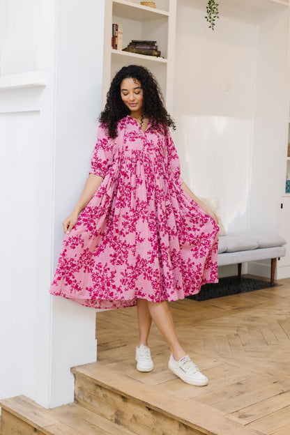 Loose fitting midi dress in pink floral print