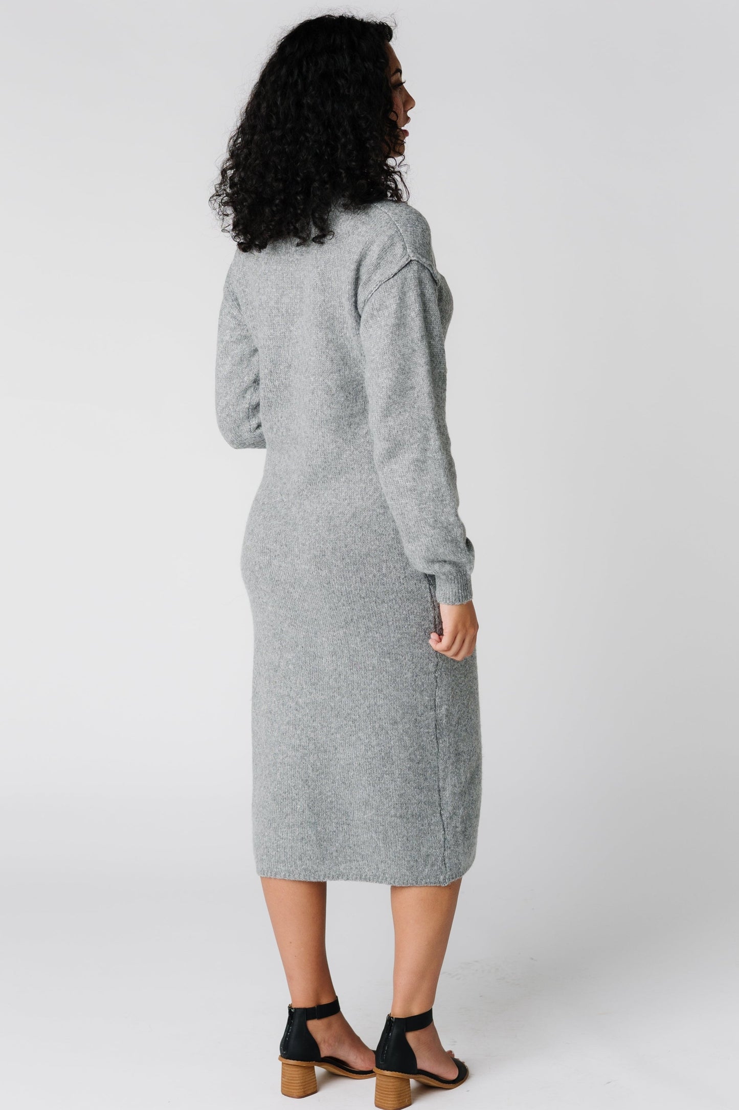 Back view of light grey sweater dress