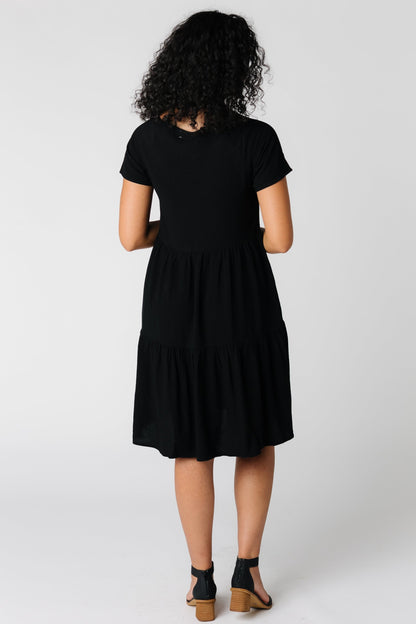 Back view of black short sleeve dress