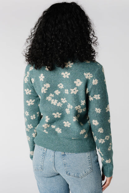 Back view of sea green floral sweater