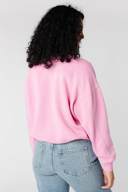 Back view of pink long sleeve sweatshirt