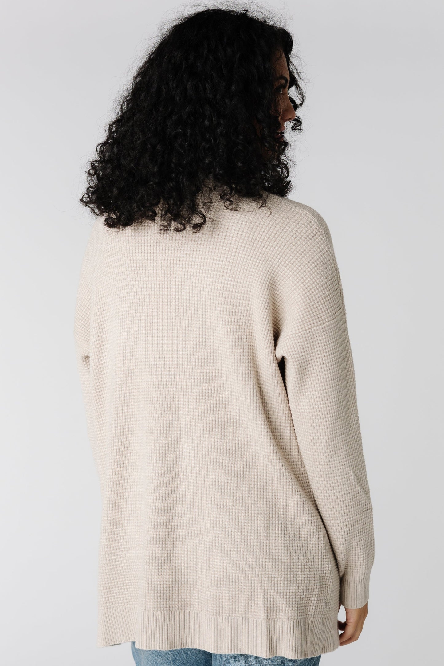 Back view of long sleeve warm grey cardigan