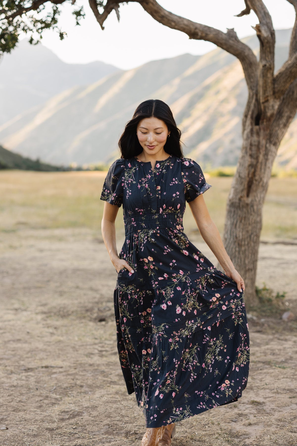 A Citrus Shae Dress in a navy floral print for women and teen girls.
