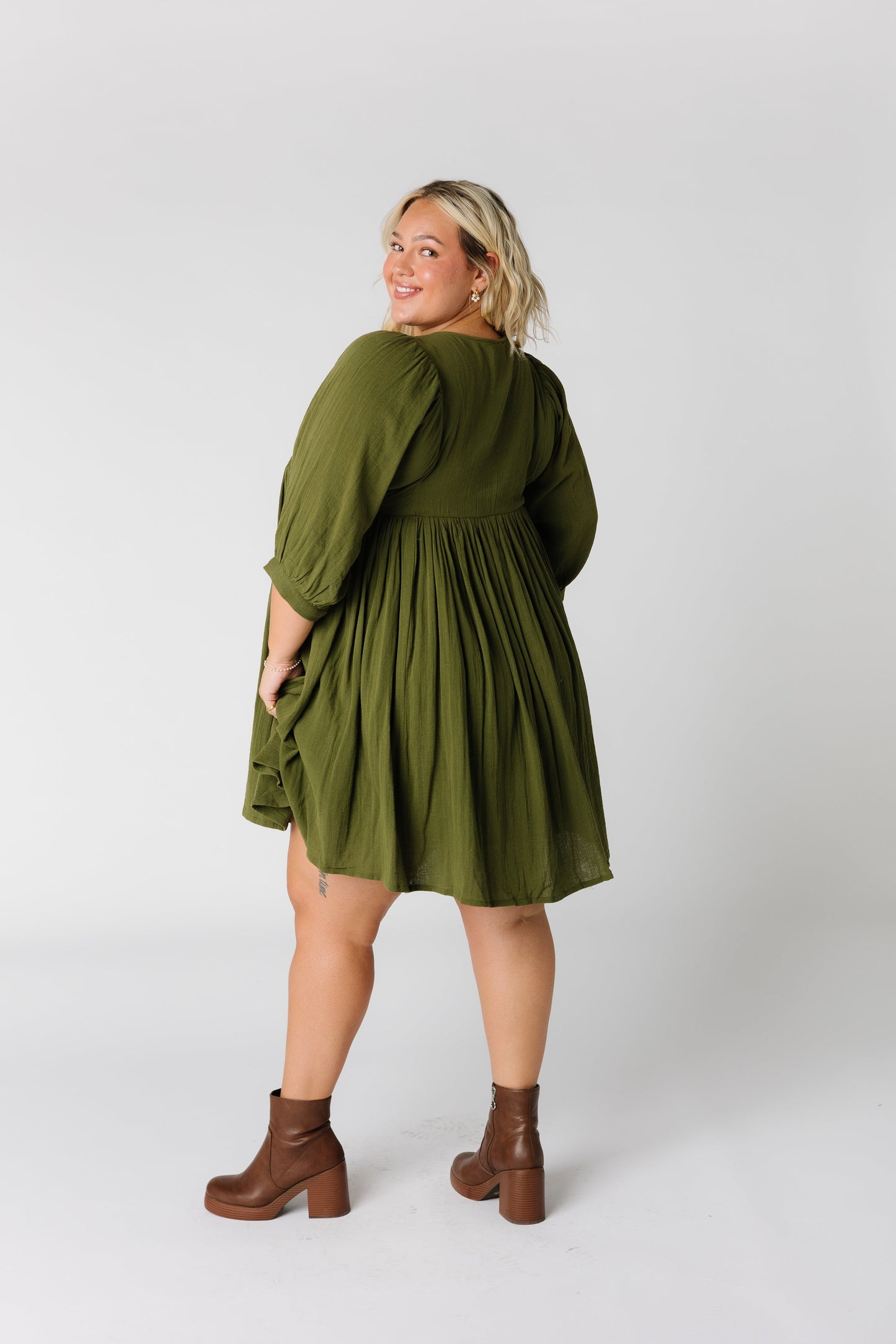 Back view of olive knee length dress