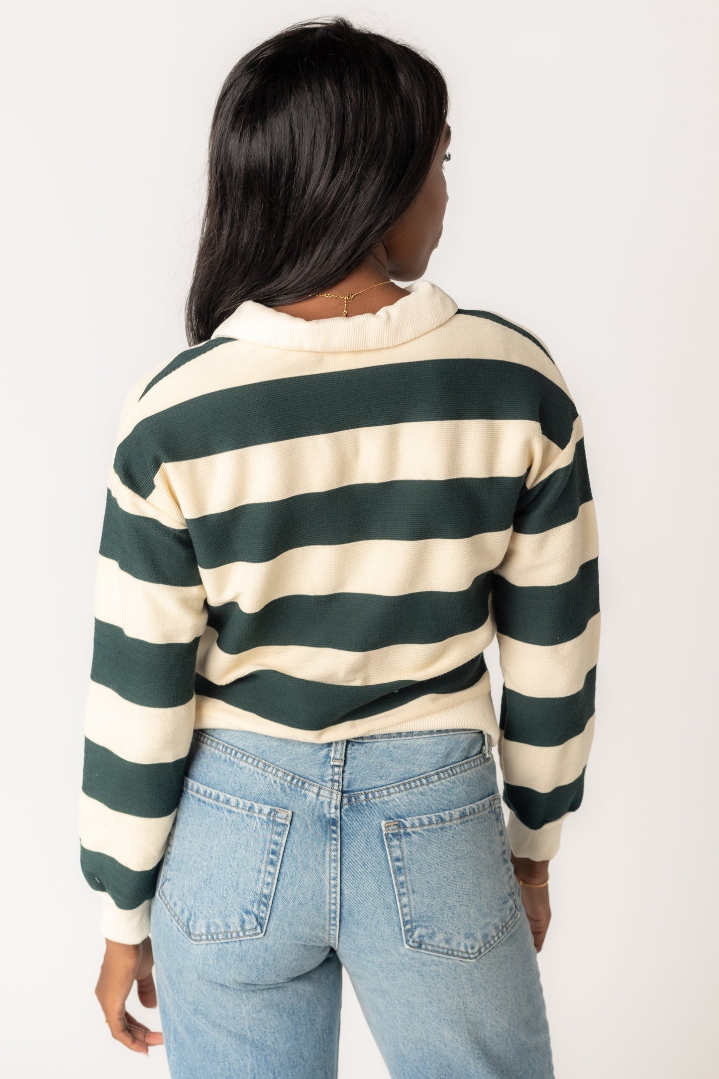 Back view of green stripe top with collar and long sleeves