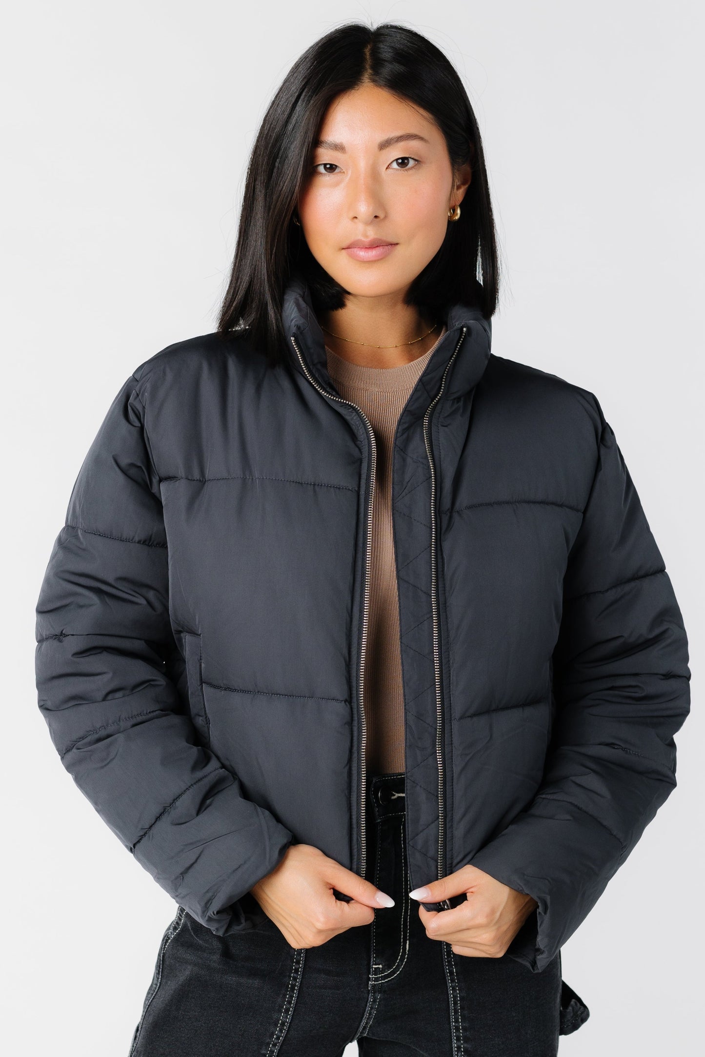 Black puffer jacket with front pockets