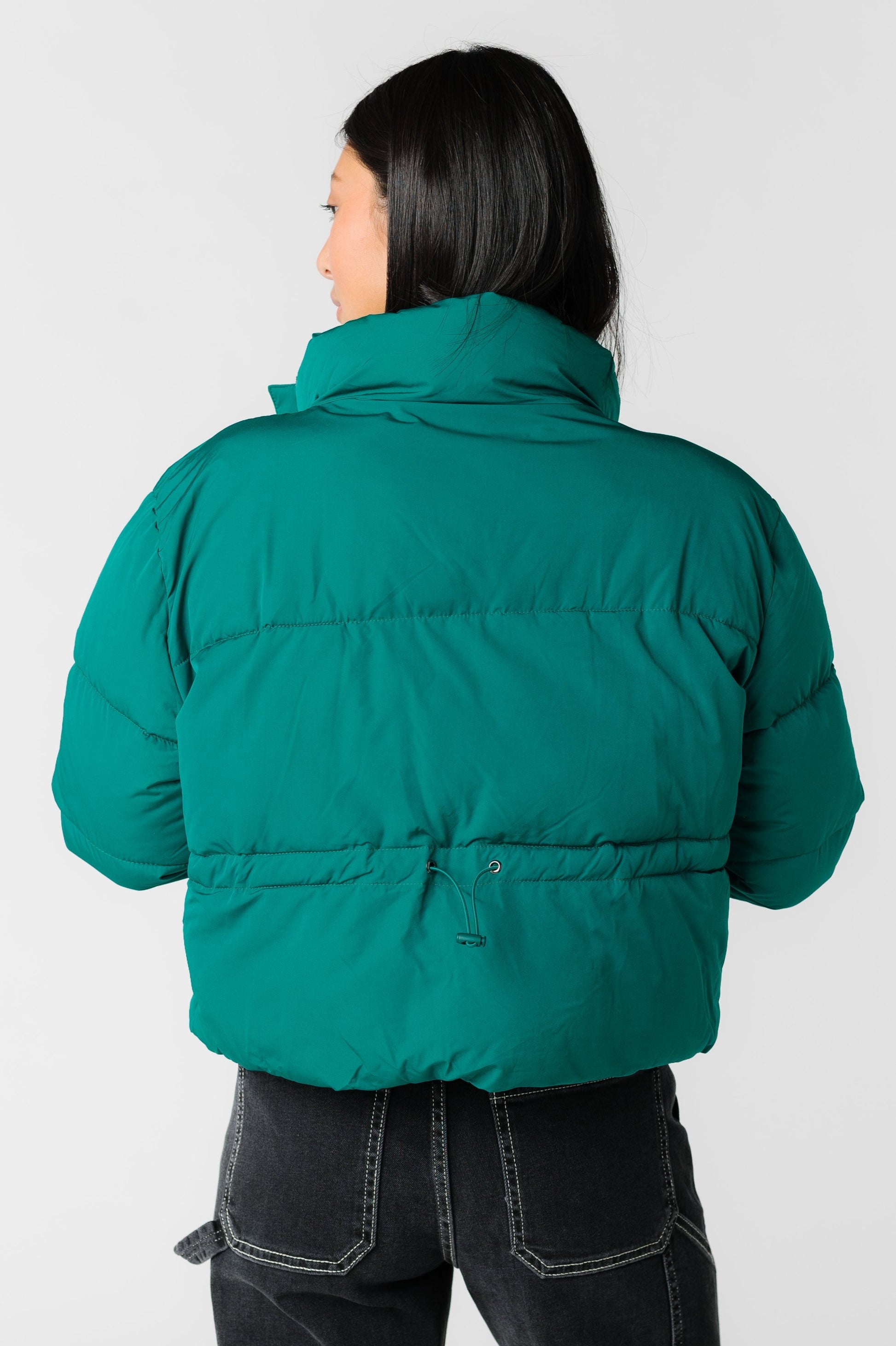 Back view of green puffer jacket