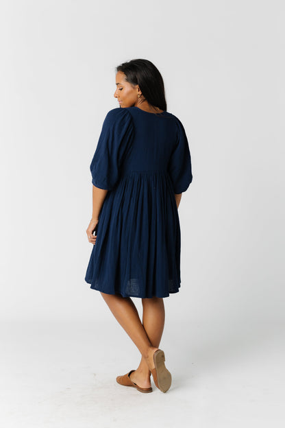 Back view of navy knee length dress