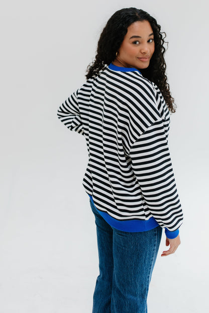 Back view of black and white stripe sweatshirt