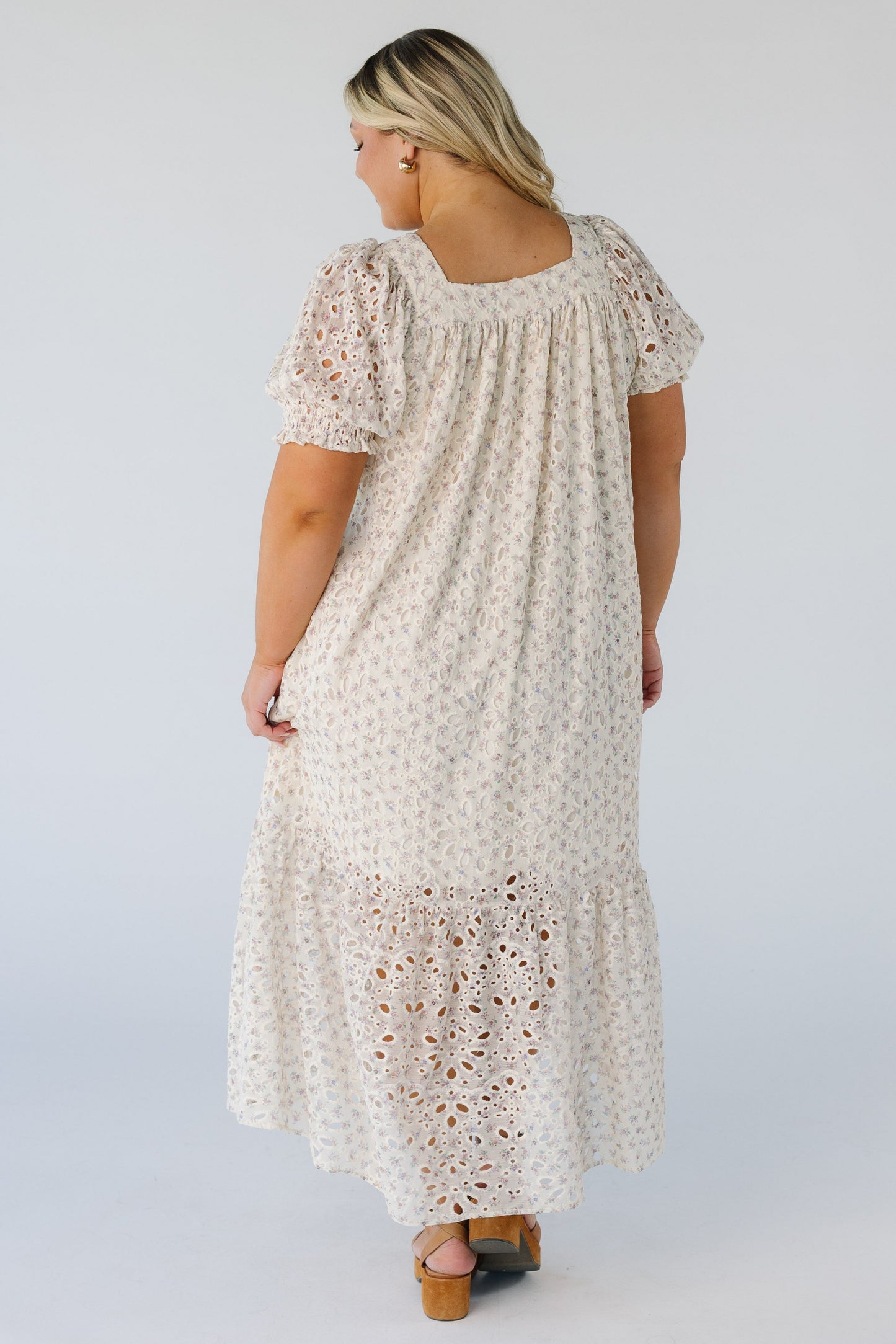 Back view of plus size midi