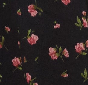 Black and pink floral fabric swatch
