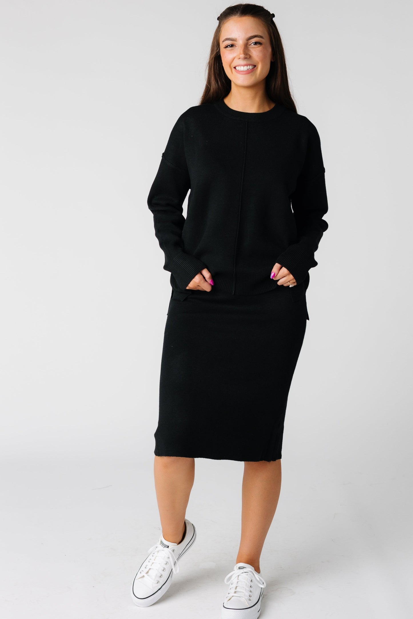 Black long sleeve sweater with knee length sweater pencil skirt