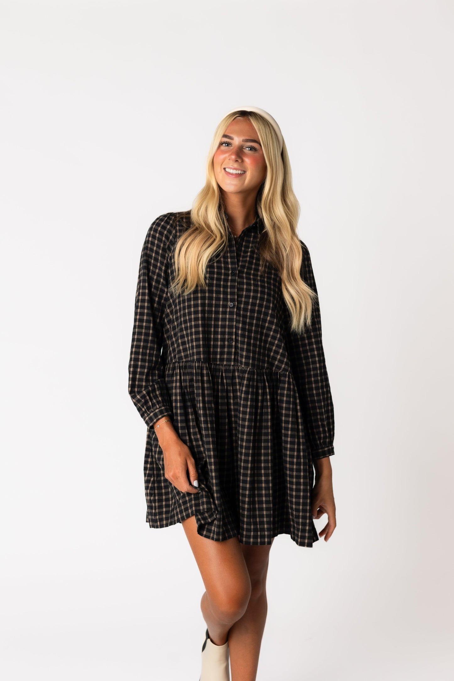 Black and brown plaid dress with button down bodice dress