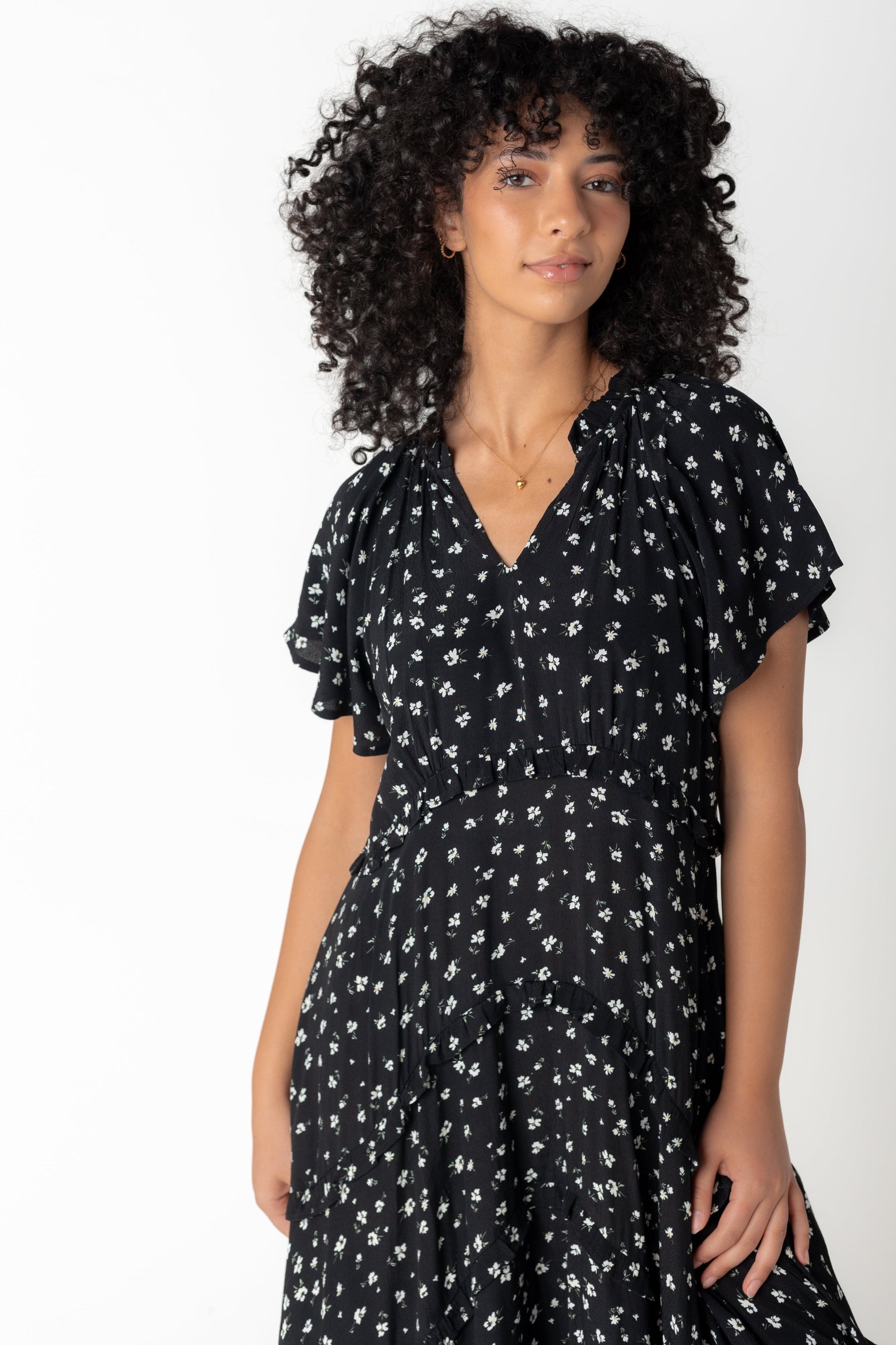 Close view of V-neck midi dress with short sleeves