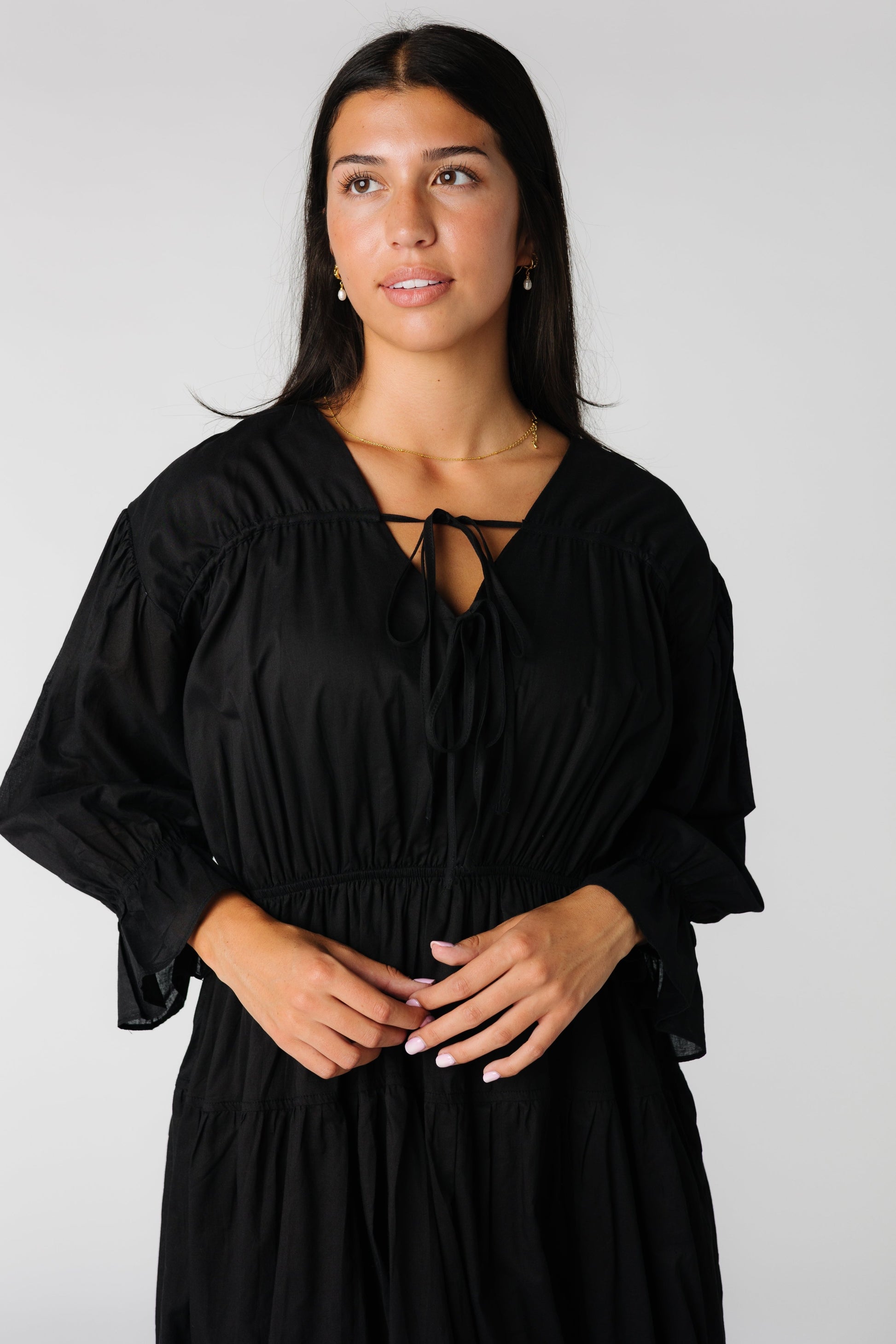 Black loose bodice dress with ties at neckline