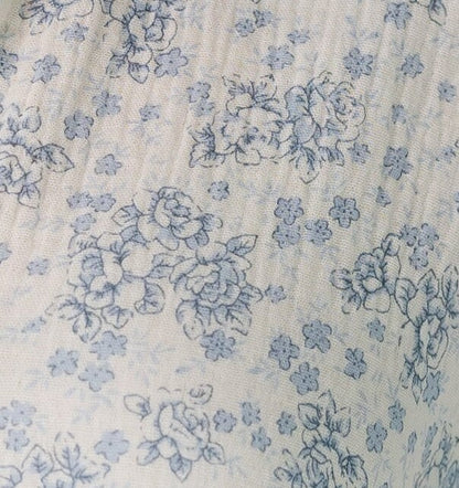 White with blue floral print fabric swatch.